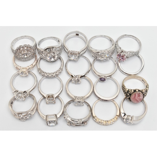 106 - A BAG OF TWENTY WHITE METAL RINGS, of various designs most set with cubic zirconia, one set with a r... 