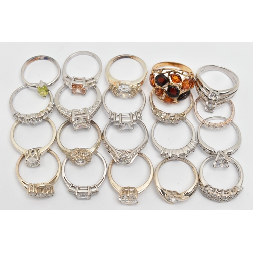 109 - A BAG OF TWENTY RINGS, to include nineteen white metal rings of various designs, most set with cubic... 