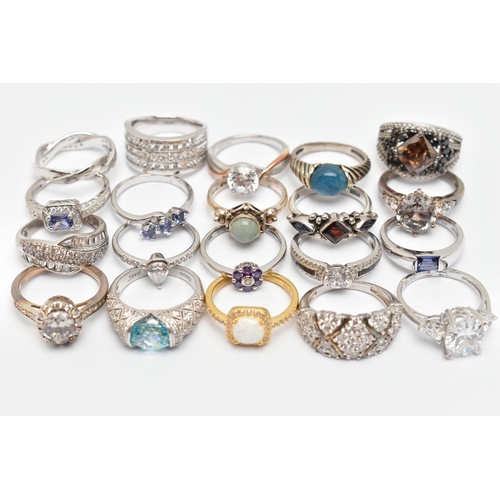 112 - A BAG OF TWENTY RINGS, to include nineteen white metal rings of various designs, most set with cubic... 