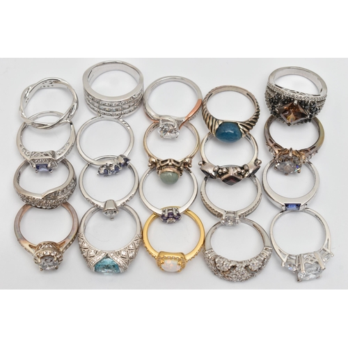 112 - A BAG OF TWENTY RINGS, to include nineteen white metal rings of various designs, most set with cubic... 