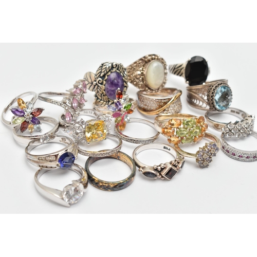 113 - A BAG OF TWENTY WHITE METAL RINGS, of various designs, some set with cubic zirconia or semi-precious... 