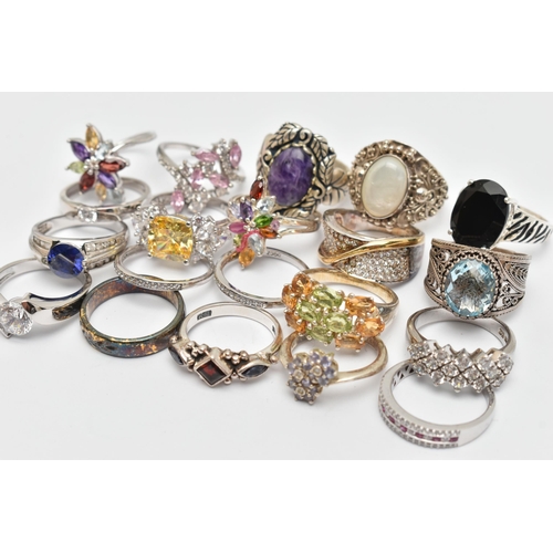 113 - A BAG OF TWENTY WHITE METAL RINGS, of various designs, some set with cubic zirconia or semi-precious... 