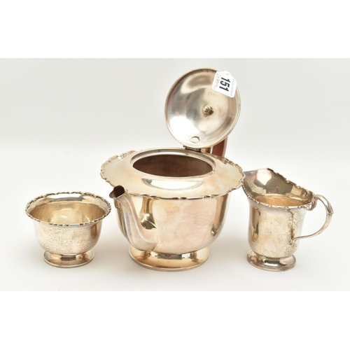 151 - A GEORGE VI SILVER THREE PIECE TEA SET, comprising of a polished form with wavy rim teapot, hinged c... 