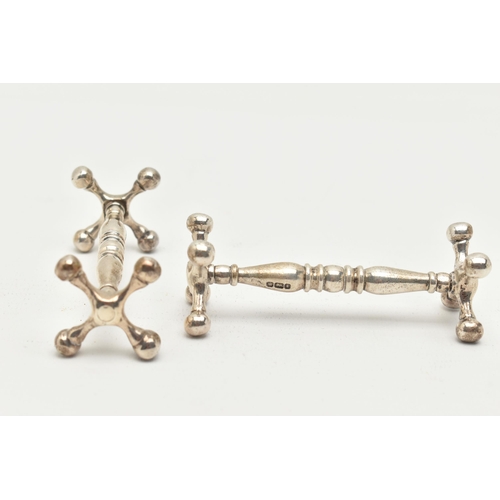 156 - A PAIR OF EARLY 20TH CENTURY SILVER KNIFE RESTS, each hallmarked 'Walker & Hall' Sheffield 1902, app... 