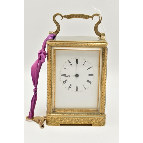 163 - A LATE 19TH CENTURY AUGUSTE OF PARIS STRIKING BRASS CASED CARRIAGE CLOCK, the handle and case ornate... 