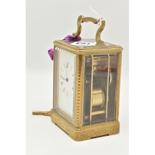 163 - A LATE 19TH CENTURY AUGUSTE OF PARIS STRIKING BRASS CASED CARRIAGE CLOCK, the handle and case ornate... 