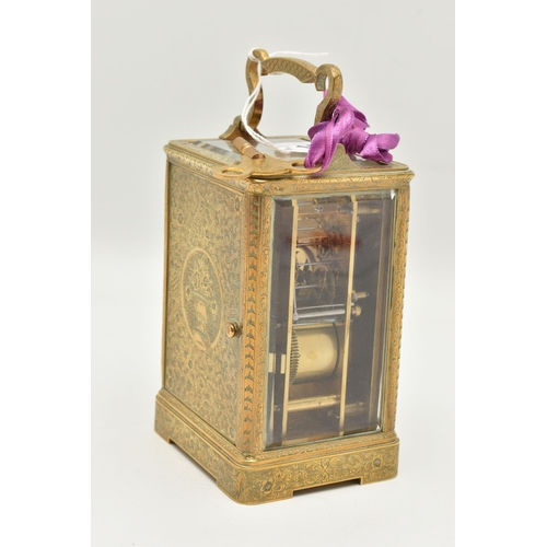 163 - A LATE 19TH CENTURY AUGUSTE OF PARIS STRIKING BRASS CASED CARRIAGE CLOCK, the handle and case ornate... 