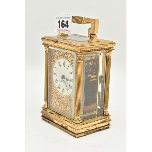 164 - A MAPPIN & WEBB LTD. CARRIAGE CLOCK, the brass clock with glass panels, approximate height 110mm