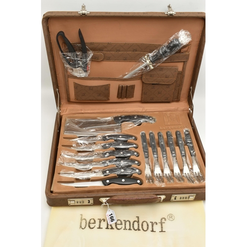 166 - A 'BERKENDORF' BRIEFCASE CANTEEN, complete with steak knives and forks, butcher knife, other kitchen... 