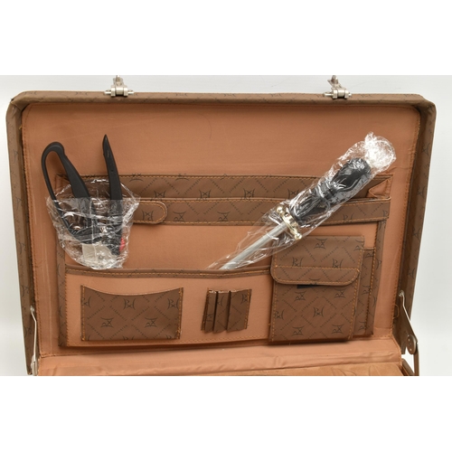 166 - A 'BERKENDORF' BRIEFCASE CANTEEN, complete with steak knives and forks, butcher knife, other kitchen... 