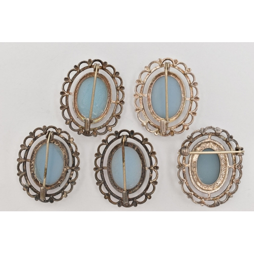 94 - FIVE WHITE METAL CAMEO BROOCHES, each set with a blue and white cameo depicting a lady in profile, t... 