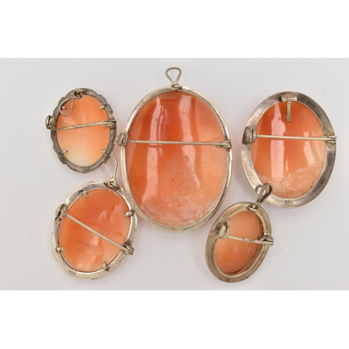 95 - FIVE WHITE METAL CAMEO BROOCHES, each of an oval form set with a carved shell cameo depicting a lady... 