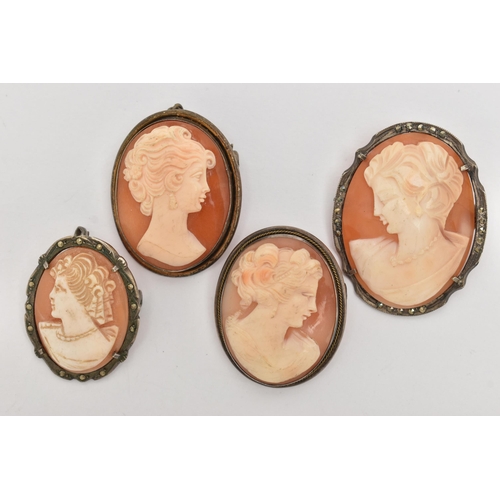 96 - FOUR WHITE METAL CAMEO BROOCHES, each of an oval form, set with a carved shell cameo depicting a lad... 