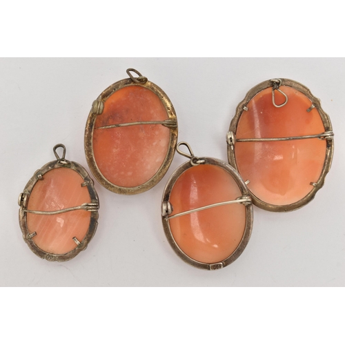 96 - FOUR WHITE METAL CAMEO BROOCHES, each of an oval form, set with a carved shell cameo depicting a lad... 