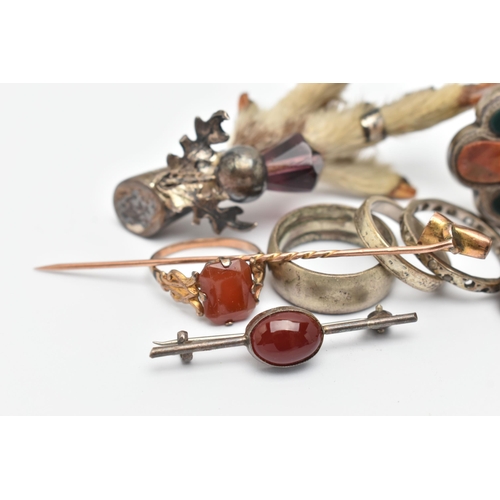 179 - AN ASSORTMENT OF LATE 19TH AND EARLY 20TH CENTURY JEWELLERY, to include a silver mounted grouse foot... 