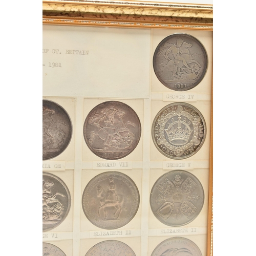 207 - A GLAZED DISPLAY OF CROWN COINS AND COMMEMORATIVES, to include George III Crown 1819 slight ding 10 ... 