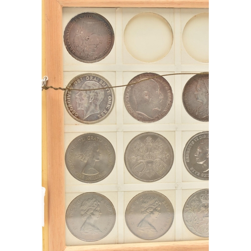 207 - A GLAZED DISPLAY OF CROWN COINS AND COMMEMORATIVES, to include George III Crown 1819 slight ding 10 ... 