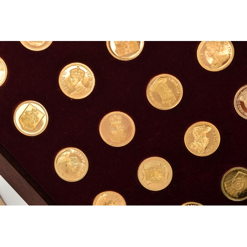 211 - A COLLECTION OF 69 SILVER GILT MEDALS PORTRAYING MOARCHS OFFA- ELIZABETH II, housed in a two drawer ... 