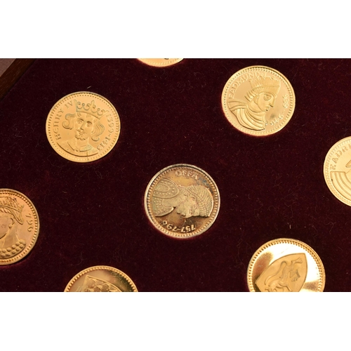 211 - A COLLECTION OF 69 SILVER GILT MEDALS PORTRAYING MOARCHS OFFA- ELIZABETH II, housed in a two drawer ... 