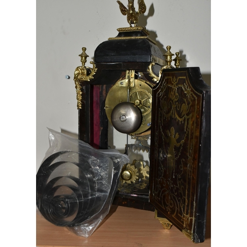 304 - A FRENCH BOULLE NINETEENTH-CENTURY MANTEL CLOCK fitted in an elaborate brass inlaid case with a cast... 