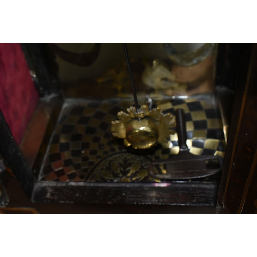 304 - A FRENCH BOULLE NINETEENTH-CENTURY MANTEL CLOCK fitted in an elaborate brass inlaid case with a cast... 