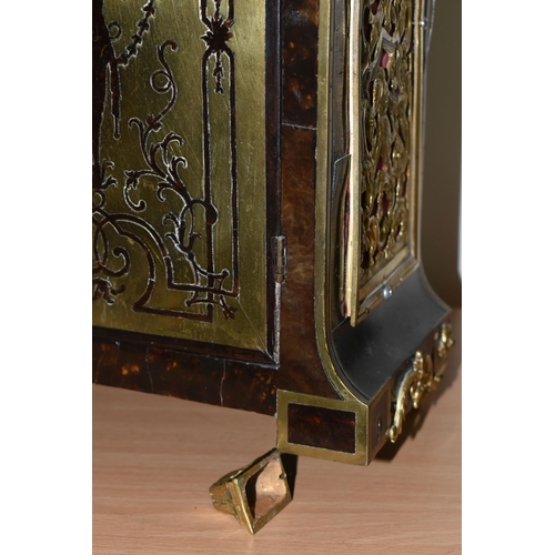 304 - A FRENCH BOULLE NINETEENTH-CENTURY MANTEL CLOCK fitted in an elaborate brass inlaid case with a cast... 