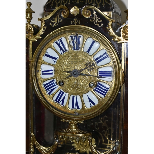 304 - A FRENCH BOULLE NINETEENTH-CENTURY MANTEL CLOCK fitted in an elaborate brass inlaid case with a cast... 