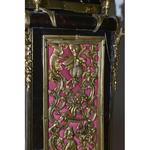 304 - A FRENCH BOULLE NINETEENTH-CENTURY MANTEL CLOCK fitted in an elaborate brass inlaid case with a cast... 