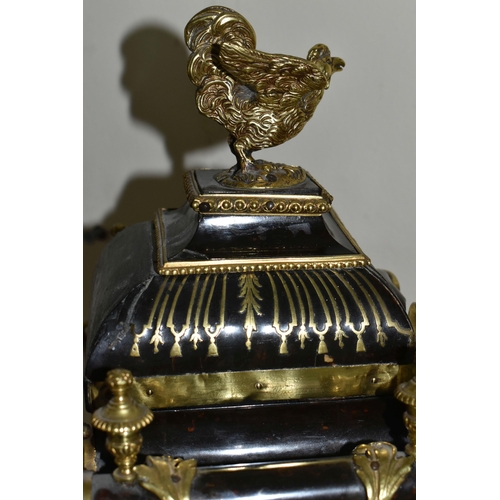 304 - A FRENCH BOULLE NINETEENTH-CENTURY MANTEL CLOCK fitted in an elaborate brass inlaid case with a cast... 