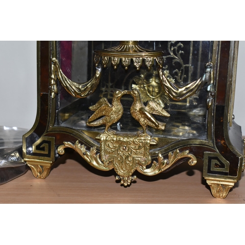 304 - A FRENCH BOULLE NINETEENTH-CENTURY MANTEL CLOCK fitted in an elaborate brass inlaid case with a cast... 