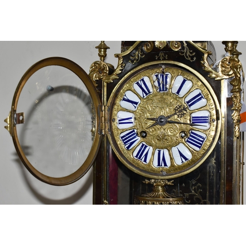 304 - A FRENCH BOULLE NINETEENTH-CENTURY MANTEL CLOCK fitted in an elaborate brass inlaid case with a cast... 