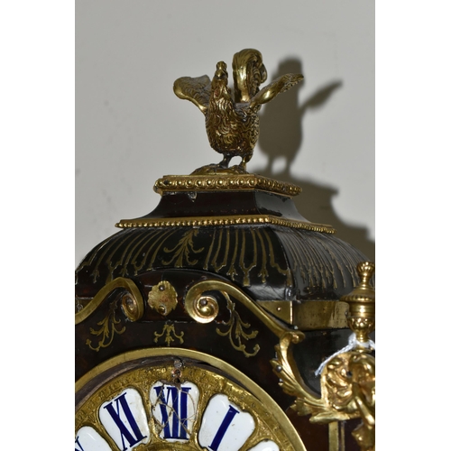 304 - A FRENCH BOULLE NINETEENTH-CENTURY MANTEL CLOCK fitted in an elaborate brass inlaid case with a cast... 