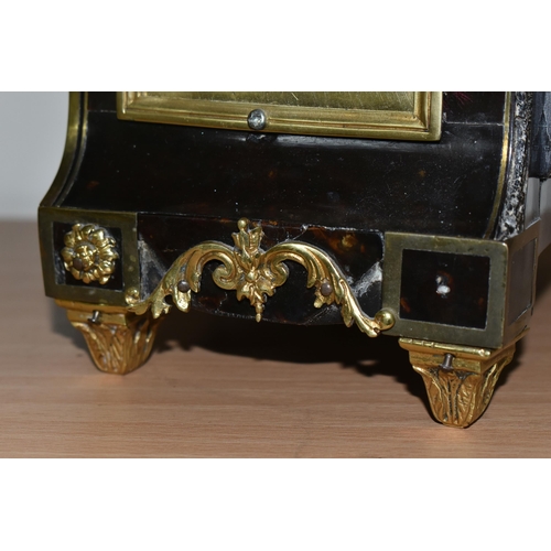 304 - A FRENCH BOULLE NINETEENTH-CENTURY MANTEL CLOCK fitted in an elaborate brass inlaid case with a cast... 