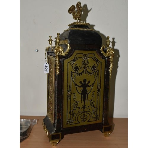 304 - A FRENCH BOULLE NINETEENTH-CENTURY MANTEL CLOCK fitted in an elaborate brass inlaid case with a cast... 