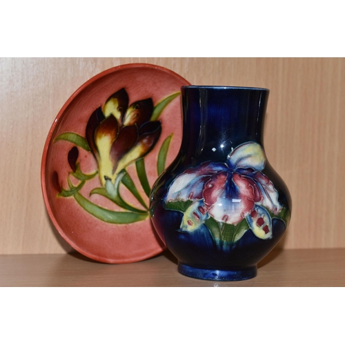 308 - A MOORCROFT FREESIA PLATE AND VASE to include a small red footed glazed trinket dish with a freesia ... 