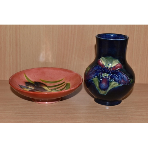 308 - A MOORCROFT FREESIA PLATE AND VASE to include a small red footed glazed trinket dish with a freesia ... 