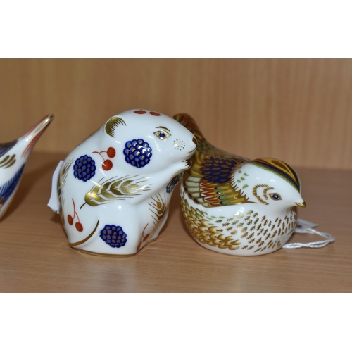 310 - A GROUP OF FOUR ROYAL CROWN DERBY PAPERWEIGHTS comprising a Harvest Mouse with a gold stopper,  a sa... 