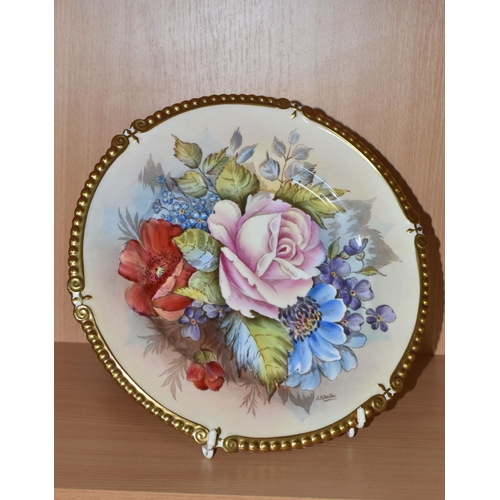 311 - AN AYNSLEY PRINTED AND TINTED PORCELAIN CABINET PLATE with a J.A.Bailey signature, with a floral pat... 