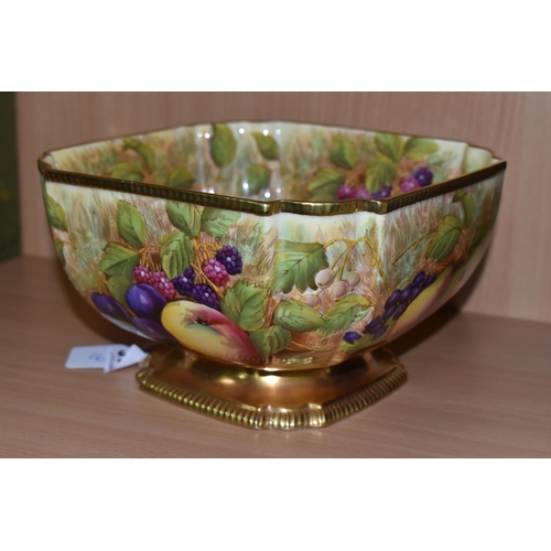 317 - A HAND-PAINTED AYNSLEY ORCHARD GOLD PEDESTAL FRUIT BOWL of canted square form, with a green manufact... 