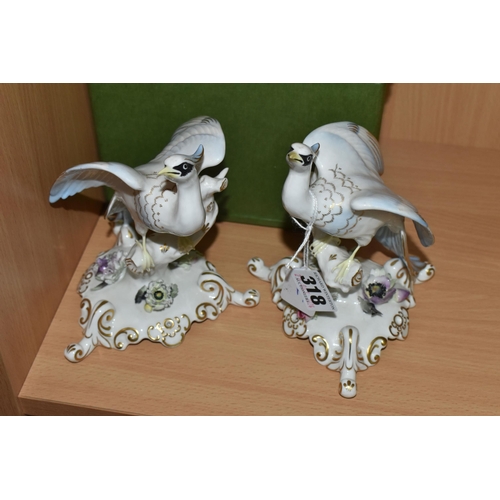 318 - A PAIR OF ''CHELSEA BIRDS'' AND A ROYAL CROWN DERBY THRUSH CHICKS ORNAMENT comprising a boxed Royal ... 