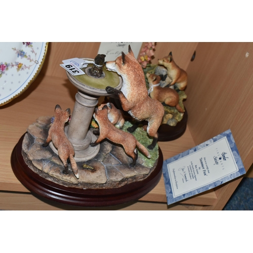 319 - TWO BORDER FINE ARTS FOX ORNAMENTS comprising 'Scenting Fun' on a plinth depicting a family of foxes... 