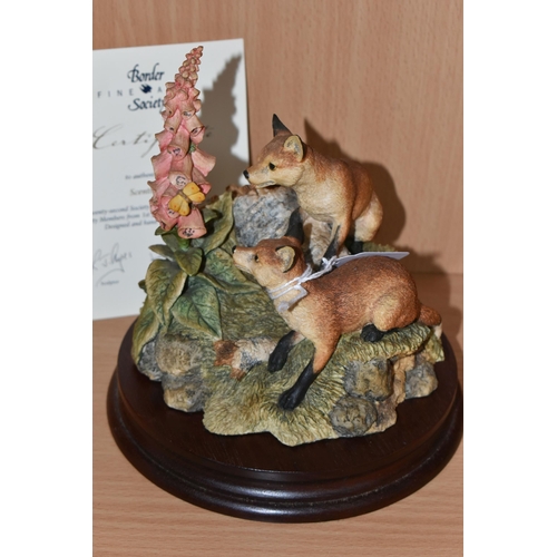 319 - TWO BORDER FINE ARTS FOX ORNAMENTS comprising 'Scenting Fun' on a plinth depicting a family of foxes... 