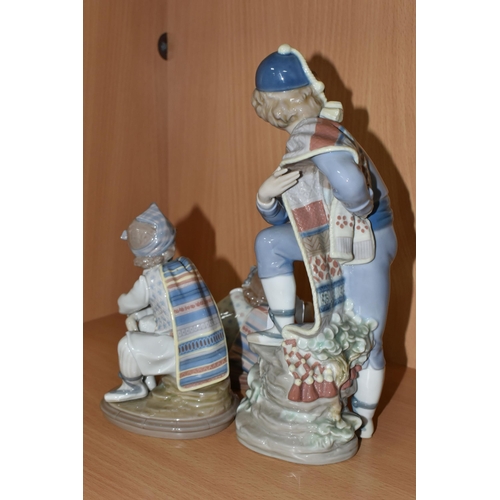 329 - THREE LLADRO PORCELAIN FIGURES, comprising Valencian Boy 5395, Valencian Bouquet 1524, and Valencian... 