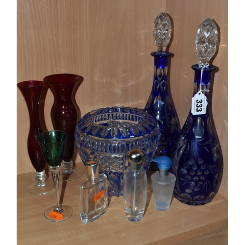 333 - A GROUP OF COLOURED GLASSWARE, comprising two cobalt blue cut to clear glass decanters, a blue cut g... 