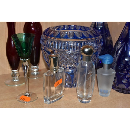 333 - A GROUP OF COLOURED GLASSWARE, comprising two cobalt blue cut to clear glass decanters, a blue cut g... 