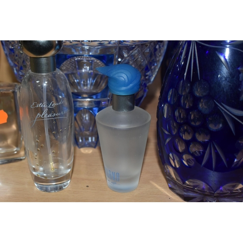 333 - A GROUP OF COLOURED GLASSWARE, comprising two cobalt blue cut to clear glass decanters, a blue cut g... 