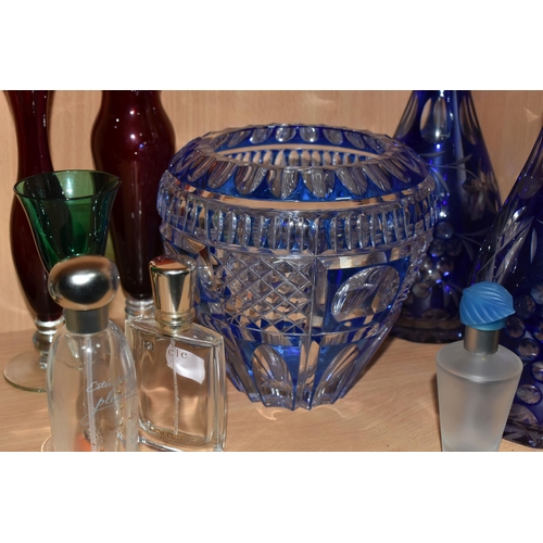 333 - A GROUP OF COLOURED GLASSWARE, comprising two cobalt blue cut to clear glass decanters, a blue cut g... 