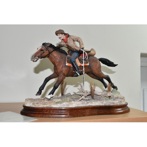 335 - A LIMITED EDITION BORDER FINE ARTS 'PONY EXPRESS' FIGURE, B1295, depicting a man on horseback gallop... 