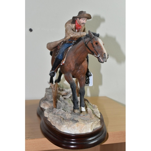 335 - A LIMITED EDITION BORDER FINE ARTS 'PONY EXPRESS' FIGURE, B1295, depicting a man on horseback gallop... 