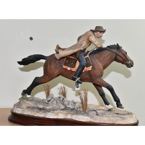 335 - A LIMITED EDITION BORDER FINE ARTS 'PONY EXPRESS' FIGURE, B1295, depicting a man on horseback gallop... 